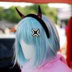 Black and gold laser-engraved acrylic Black Cloud angry anime symbol hair clip.