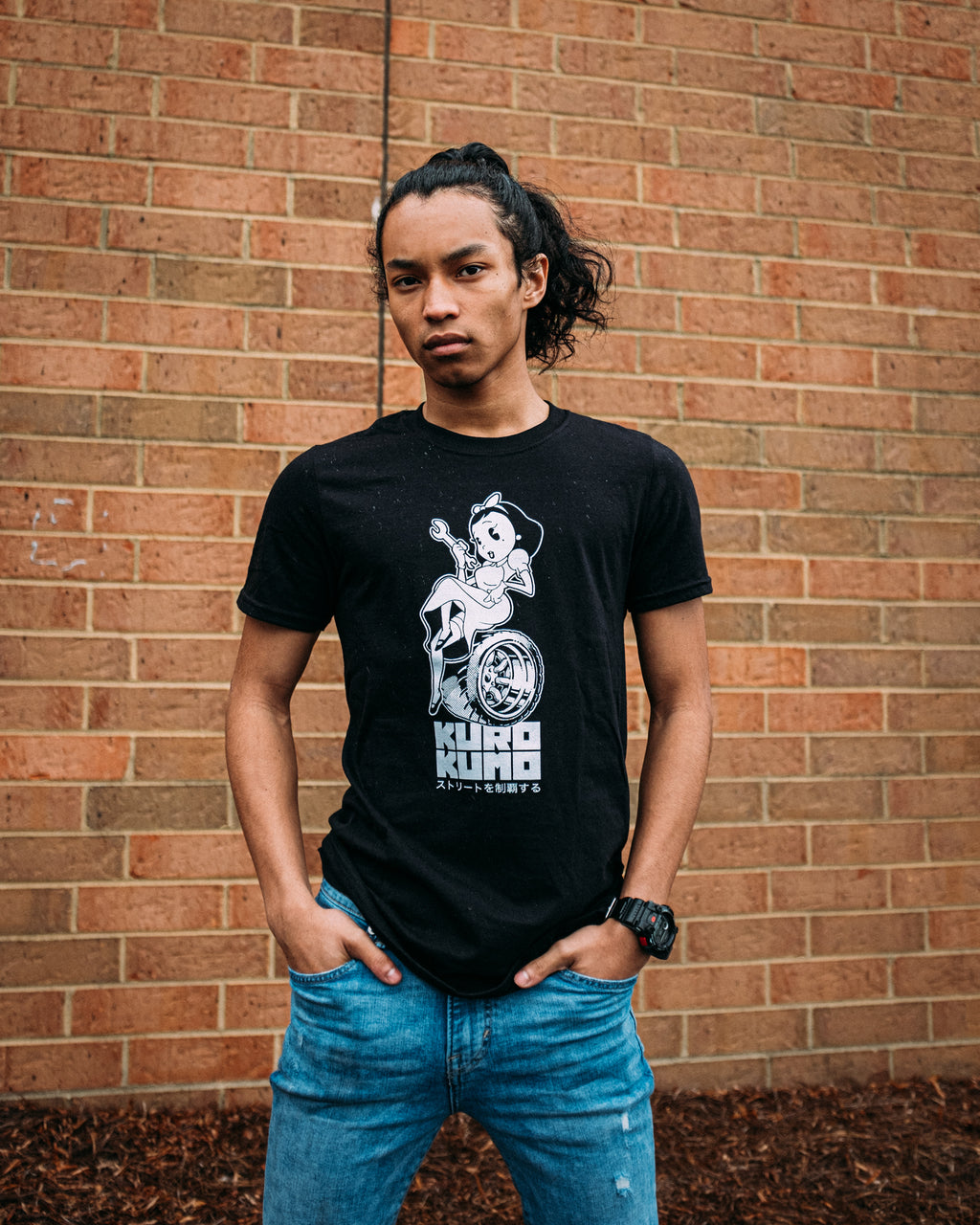 Black unisex cotton short-sleeved In the Streets T-shirt with Kuro Kumo (black cloud) design on front in white ink with pin up girl and Watanabe wheel