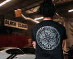Black unisex short-sleeved In the Streets T-shirt with Tokyo manhole cover on the back in grey ink