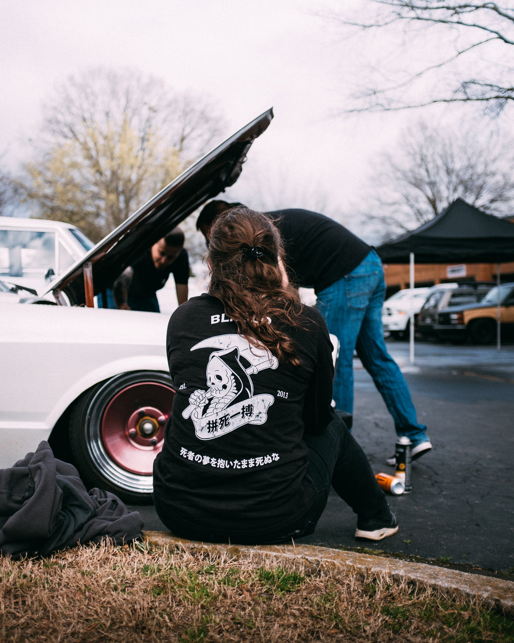 Black unisex cotton long-sleeved T-shirt with Grim Reaper Do or Die design on back in white ink. 