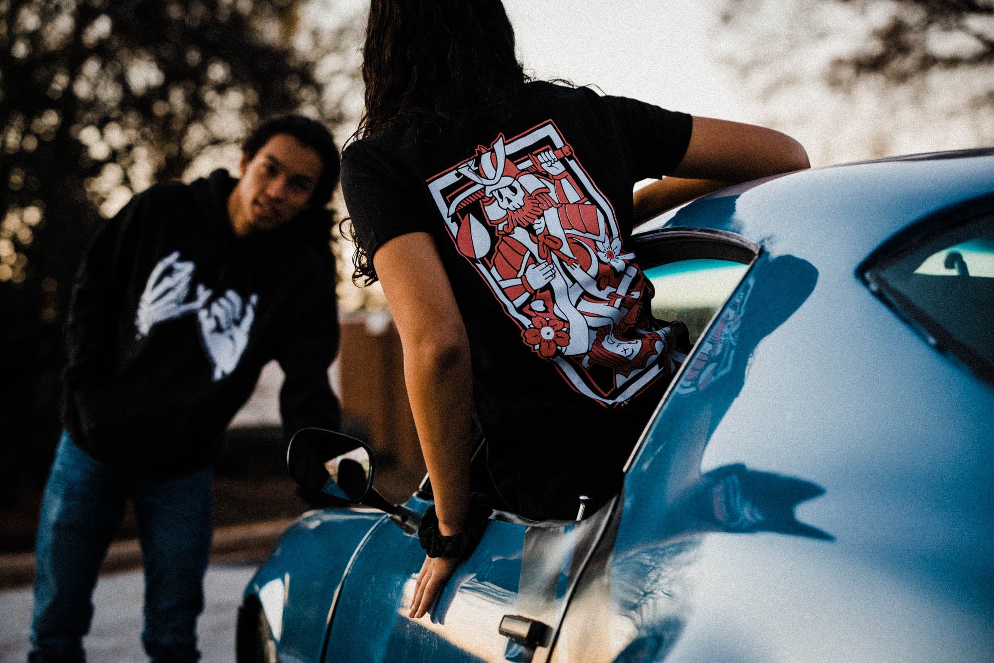 Black cotton T-shirt with pink and white  Kyusha's wager playing card full back print. 