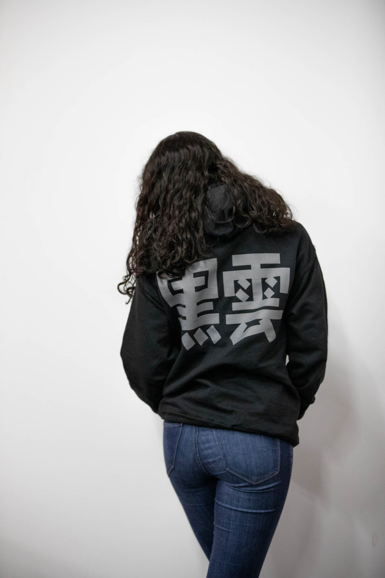 Unisex black hoodie with promise (Yakusoko) design on front in white ink and black cloud Kuro Kumo Japanese kanji characters in gray on back.