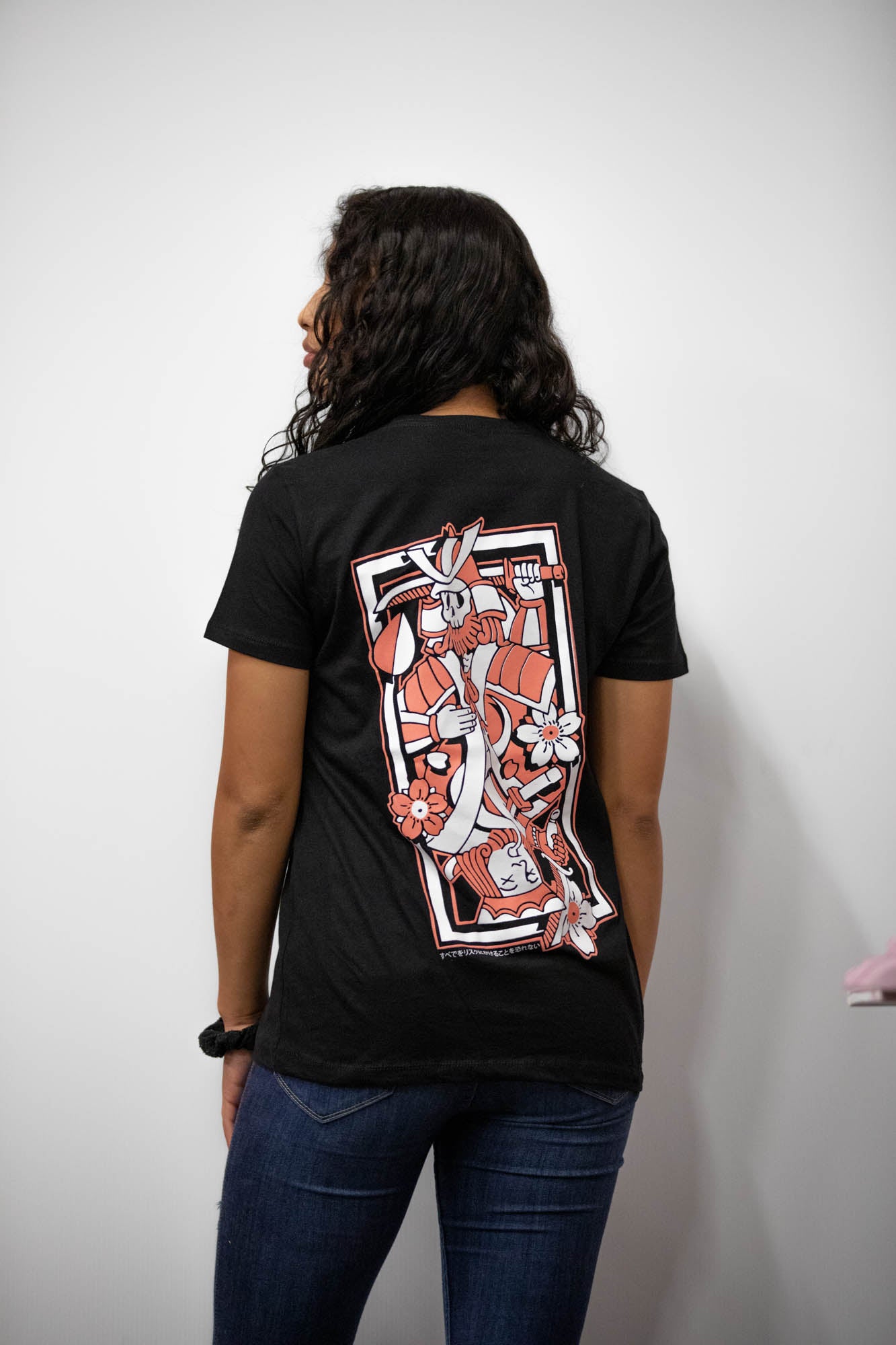 Black unisex cotton T-shirt with pink and white  Kyusha's wager playing card full back print. 