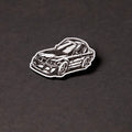 Silver and black engraved chibi BMW E36 acrylic lapel pin