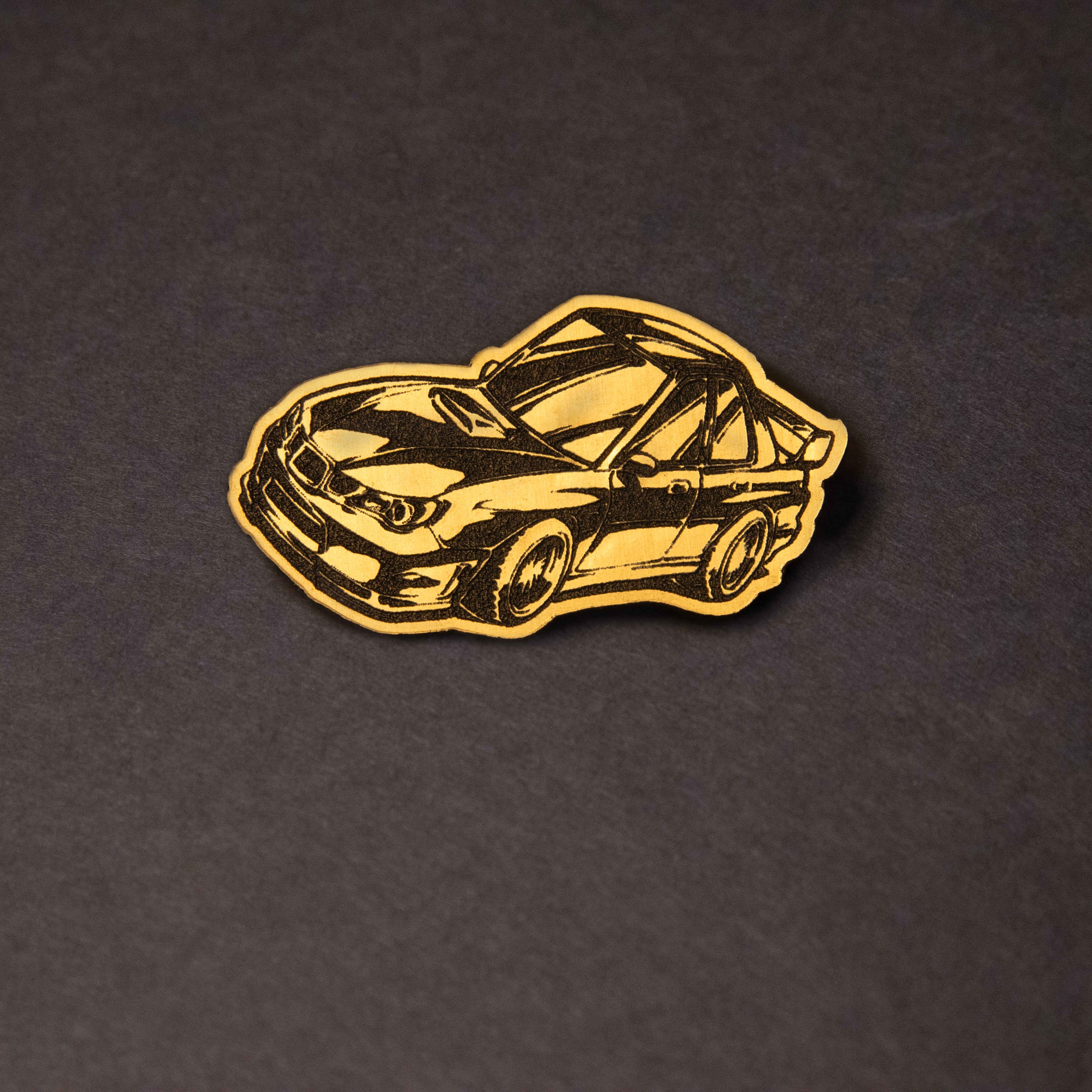 gold and black chibi Subaru WRX acrylic lapel car pin