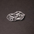 silver and black chibi Subaru WRX acrylic lapel car pin