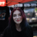 Black laser-engraved acrylic Black Cloud cat ears on a velvet black headband.