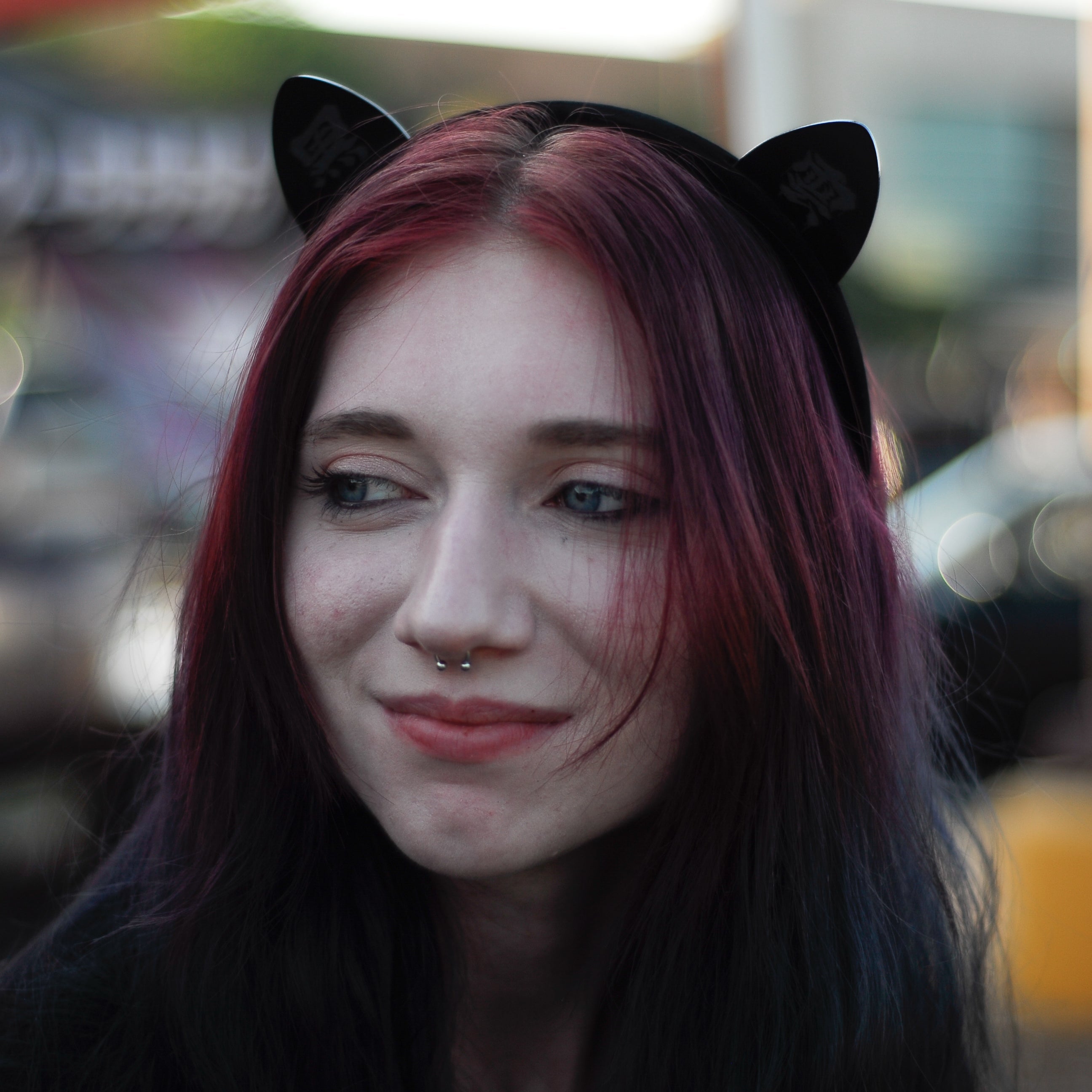 Black laser-engraved acrylic Black Cloud cat ears on a velvet black headband.