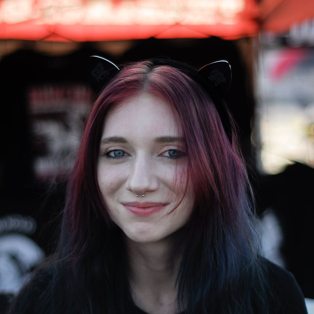 Black laser-engraved acrylic Black Cloud cat ears on a velvet black headband.