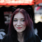 Black laser-engraved acrylic Black Cloud cat ears on a velvet black headband.