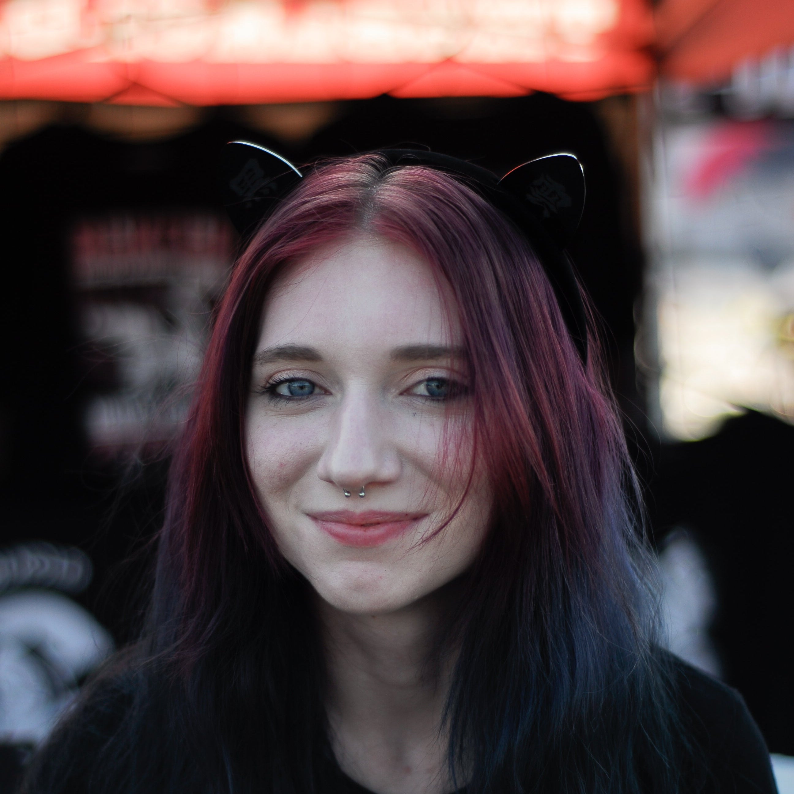 Black laser-engraved acrylic Black Cloud cat ears on a velvet black headband.