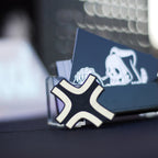 Black and gold laser-engraved acrylic Black Cloud angry anime symbol hair clip.