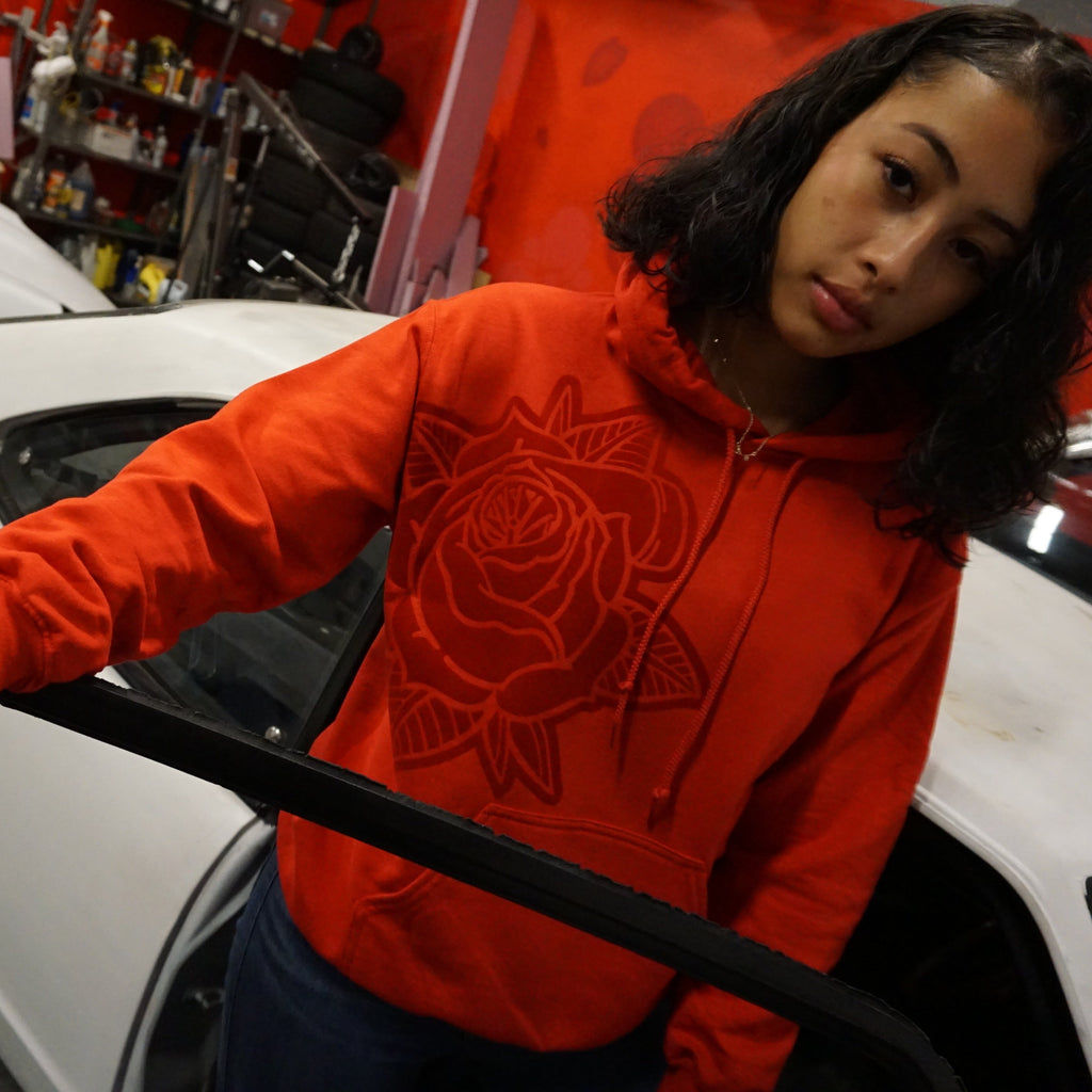 Unisex Pretty PSI red hoodie with turbo rose design on front in red velvet flock and black cloud Japanese kanji characters in red velvet flock on back.