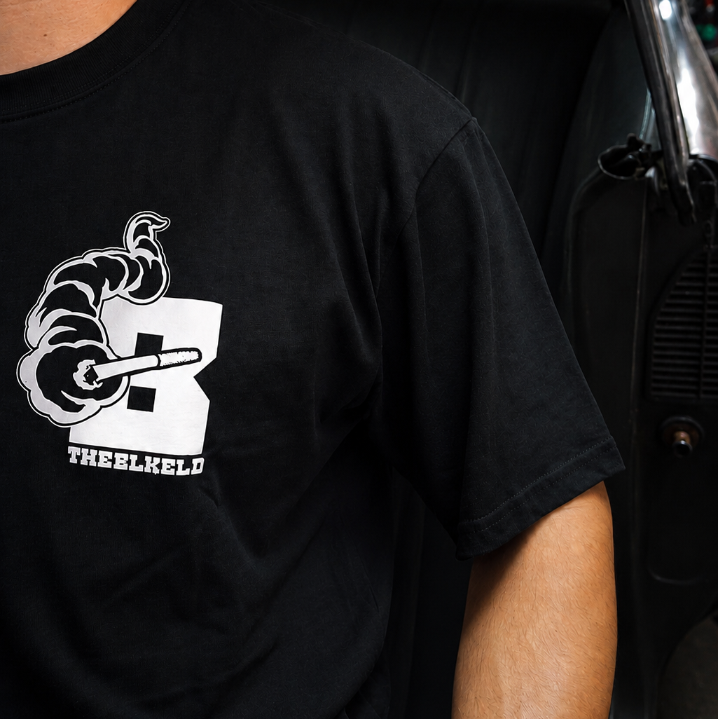 Black and white cotton unisex Street Dreams screen printed T-shirt front chest emblem