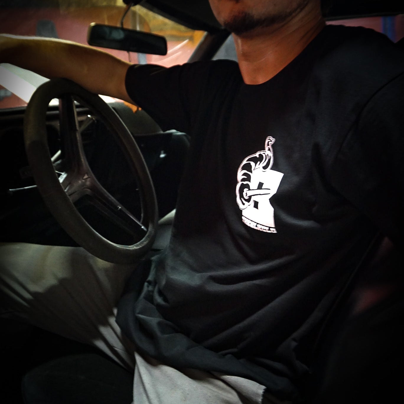 Black and white cotton unisex Street Dreams screen printed T-shirt front chest emblem