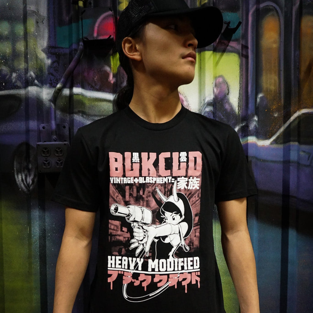 Black unisex soft cotton T-shirt with pink and white heavy modified impact girl design on the front