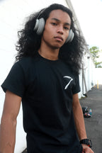 Black cotton short-sleeved T-shirt with Grim Reaper Do or Die design on back and small scythe chest emblem on front in white ink. 
