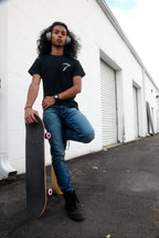 Black cotton short-sleeved T-shirt with Grim Reaper Do or Die design on back and small scythe chest emblem on front in white ink. 