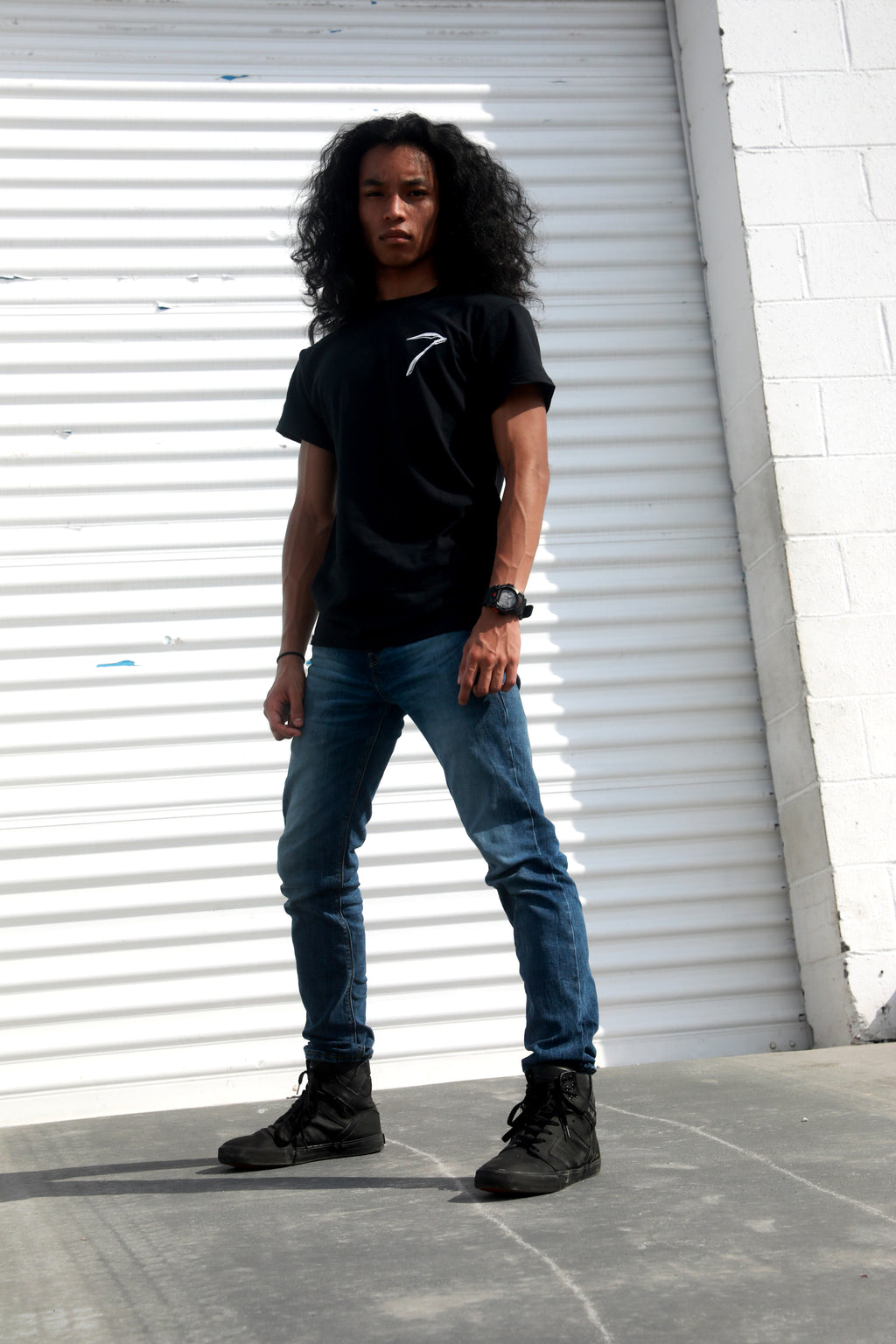 Black unisex cotton short-sleeved T-shirt with Grim Reaper Do or Die design on back and small scythe chest emblem on front in white ink. 