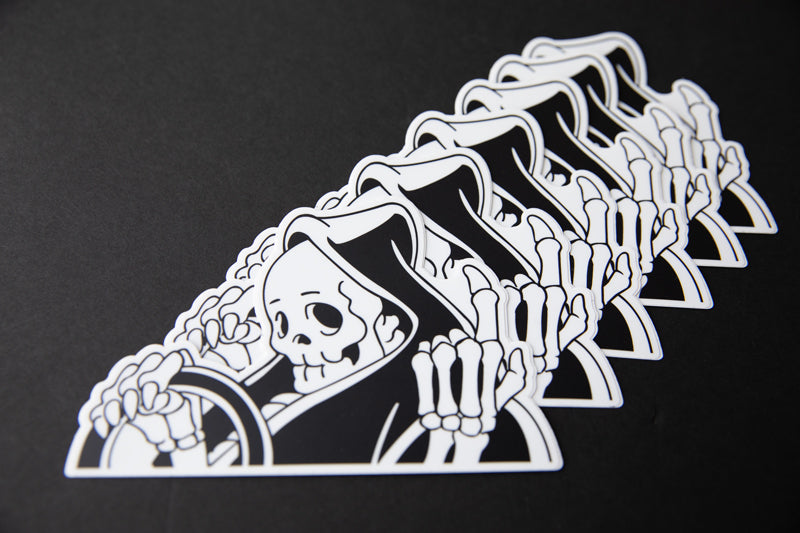 Multiple black and white vinyl No Dead End “peeker” reaper sticker. 