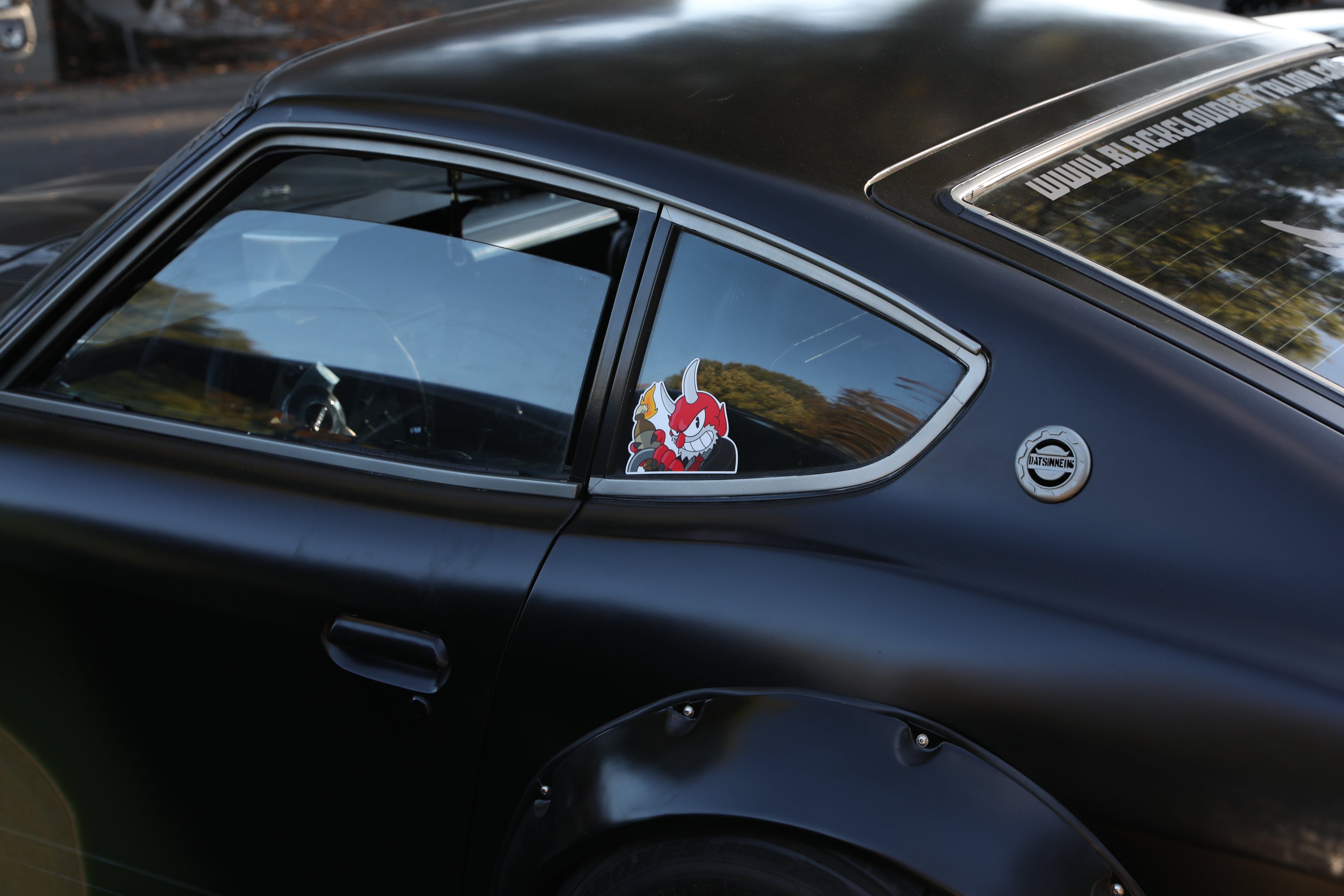 Bakudan molotov peeker sticker on LouZfer Datsun 240Z and BCB S30 Rear Quarter Panel Emblem