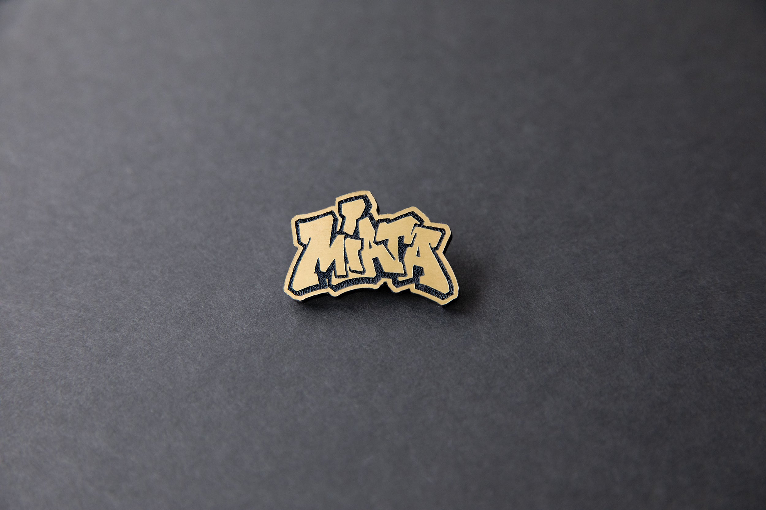 gold Miata acrylic lapel pin