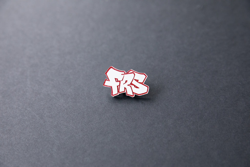 red FRS acrylic lapel pin