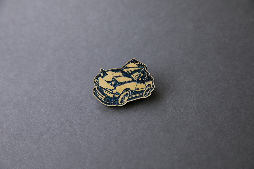 gold chibi Miata car acrylic lapel pin