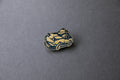 gold chibi Miata car acrylic lapel pin