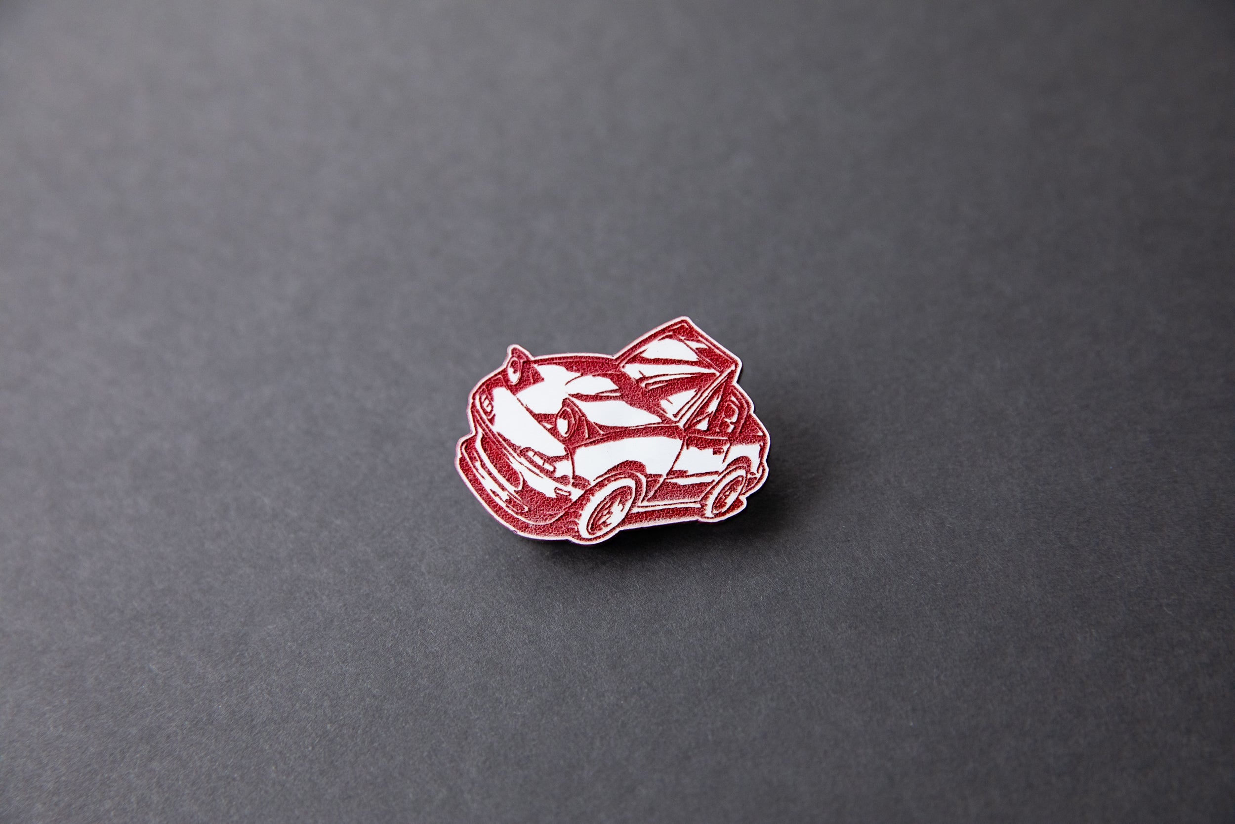 red chibi Miata car acrylic lapel pin
