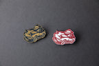 gold and red chibi Miata car acrylic lapel pins