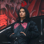 Black unisex nylon lined baseball jacket with promise (Yakusoku) design on front in hot pink