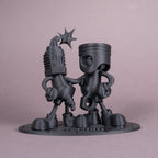 Black Cloud Chibi Piston and Spark Plug black acrylic figurine.