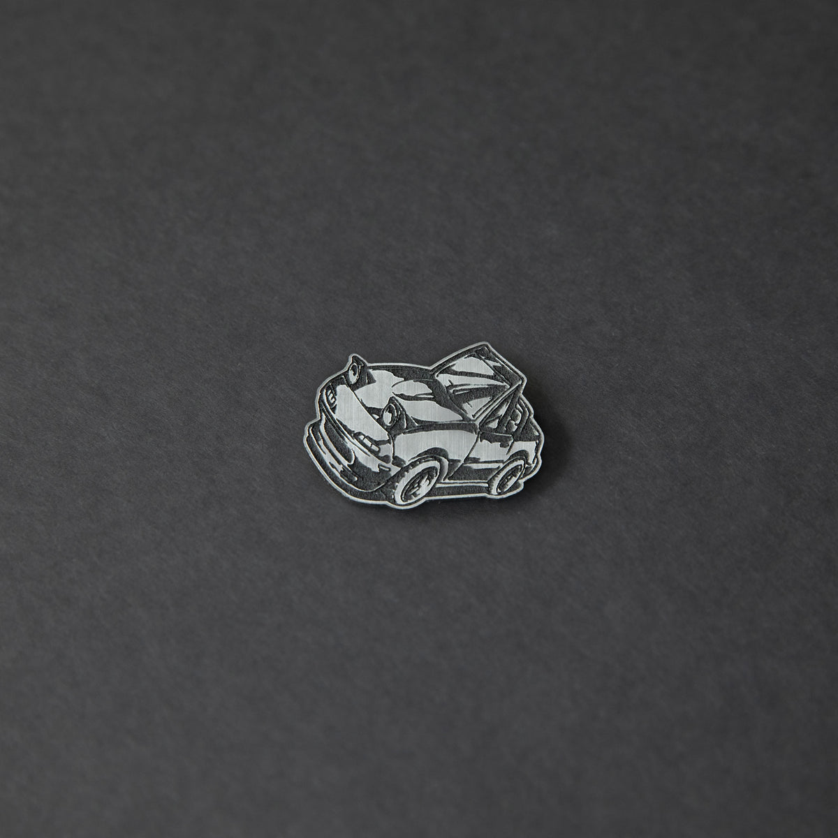 silver chibi Miata car acrylic lapel pin