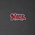 Red and white laser-engraved acrylic miata hair clip.