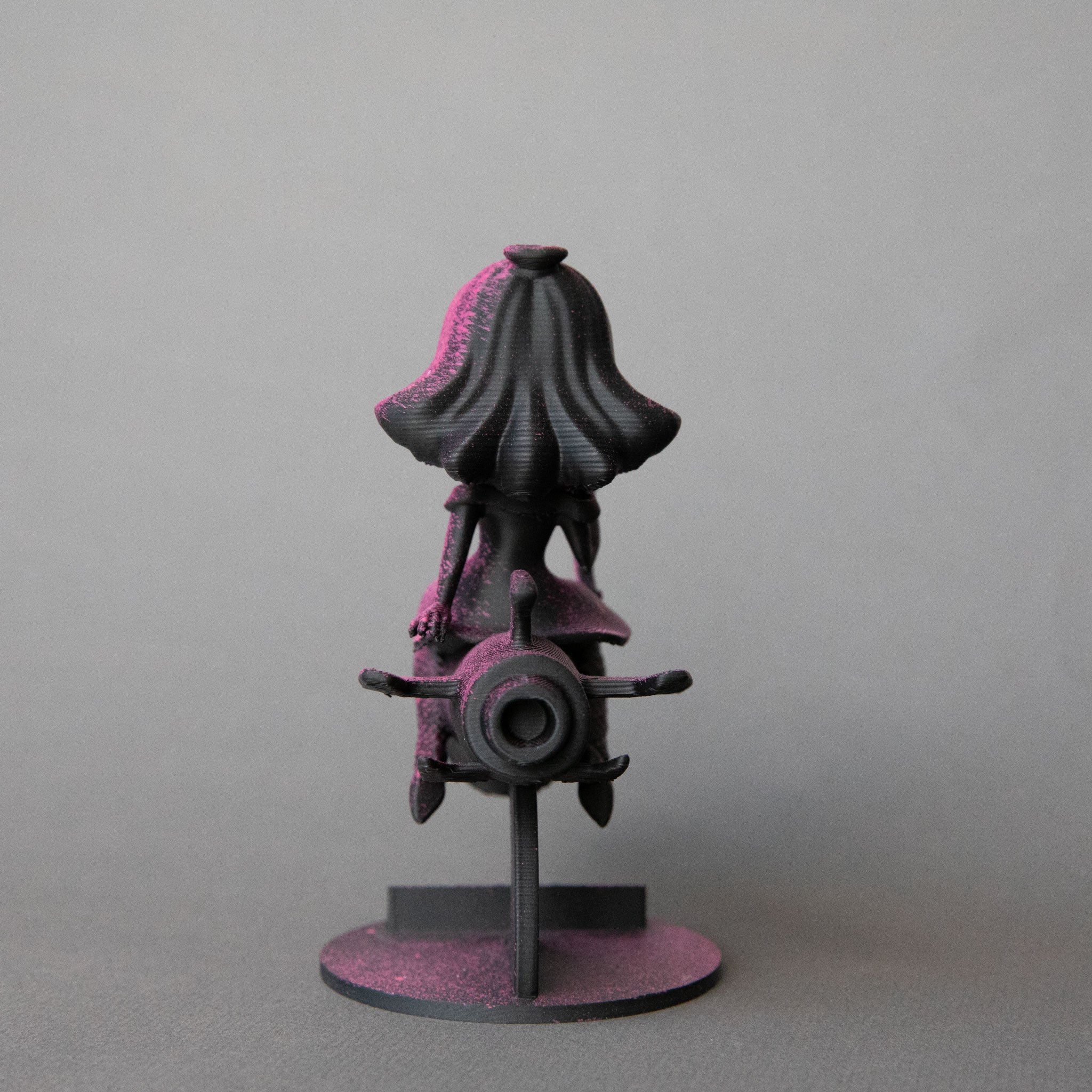 Black Cloud Chibi Miss Chief Drift Missile black and pink acrylic figurine.