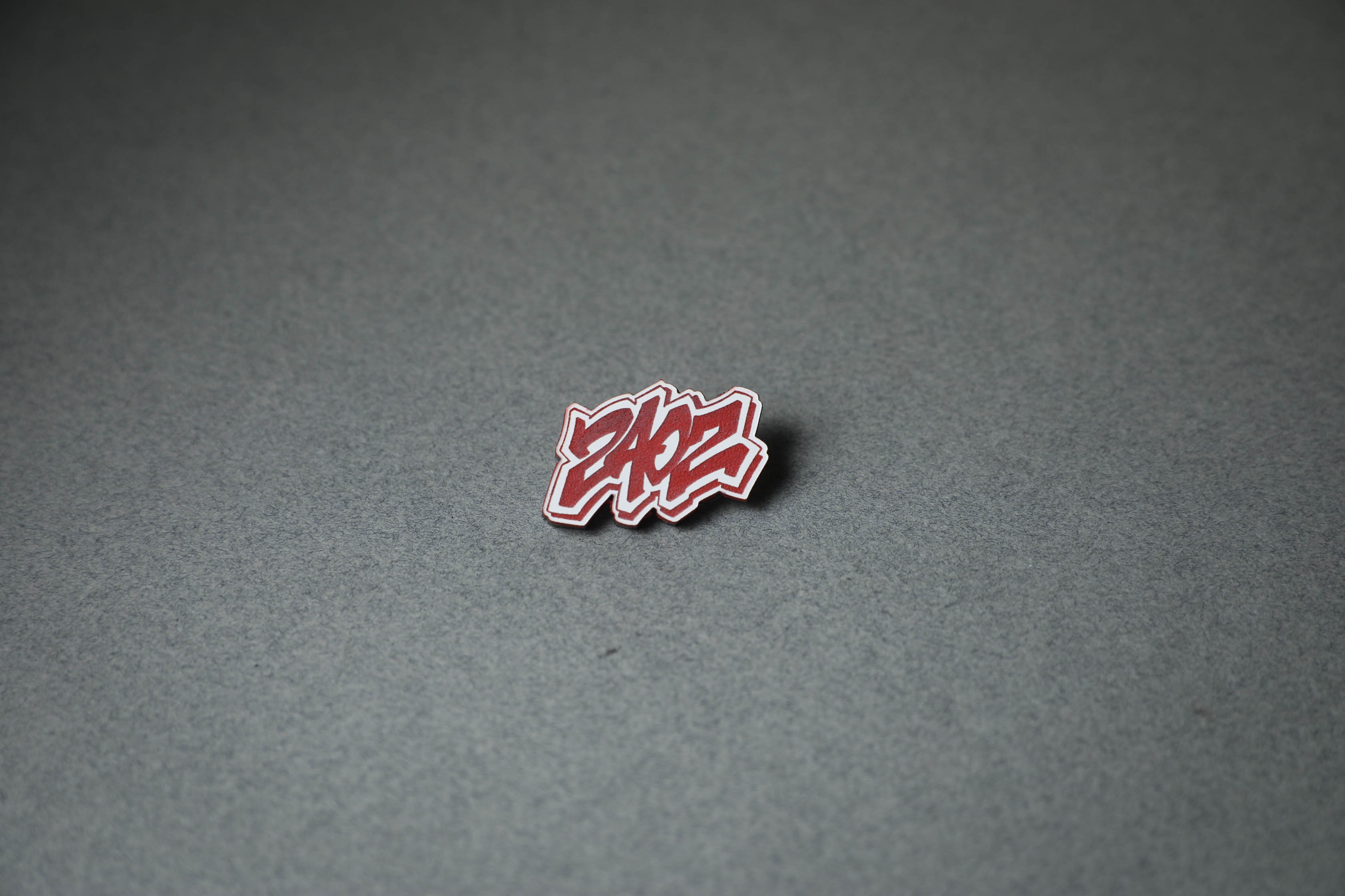 240Z letter red acrylic lapel pin.