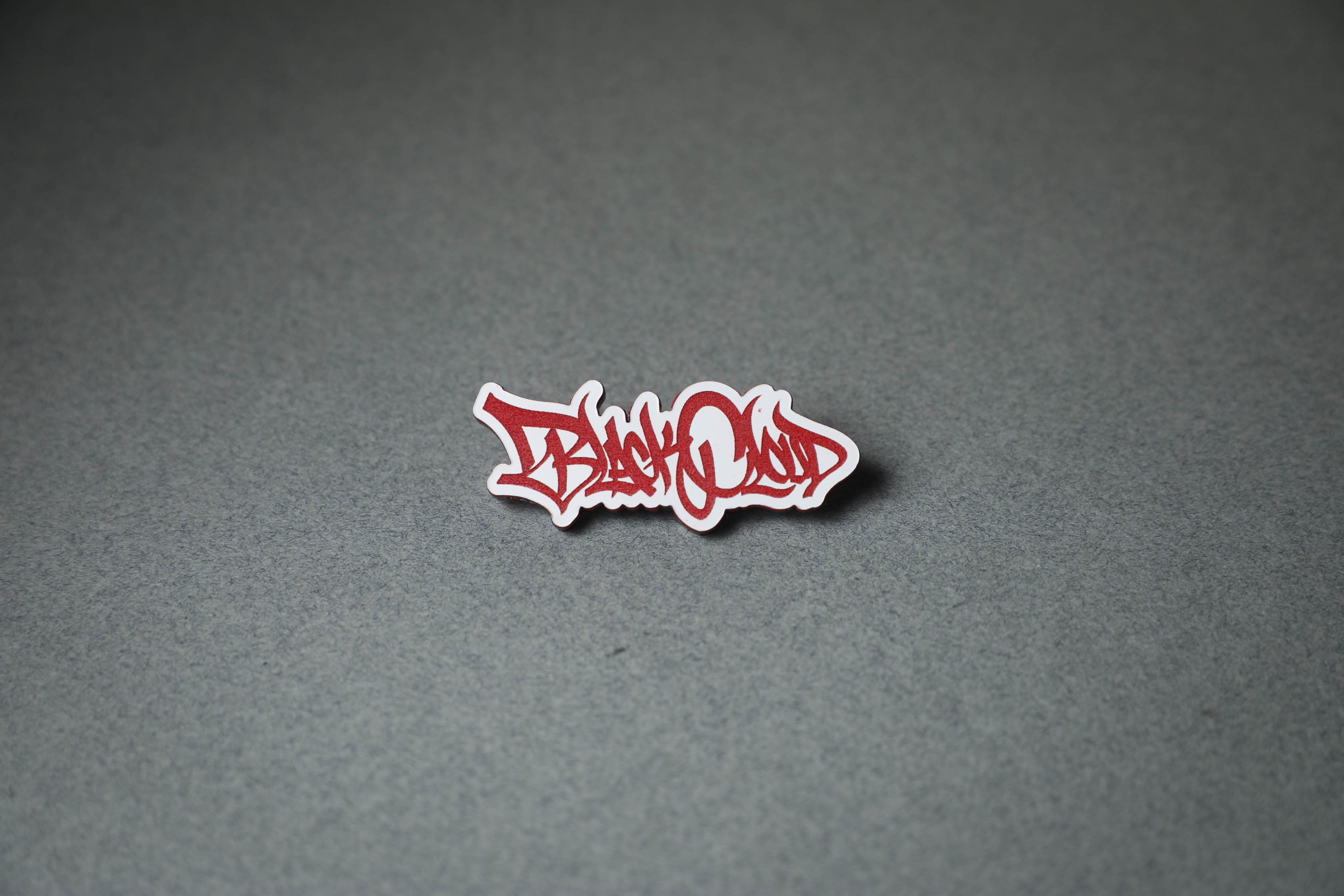 Black Cloud graffiti tag red acrylic lapel pin