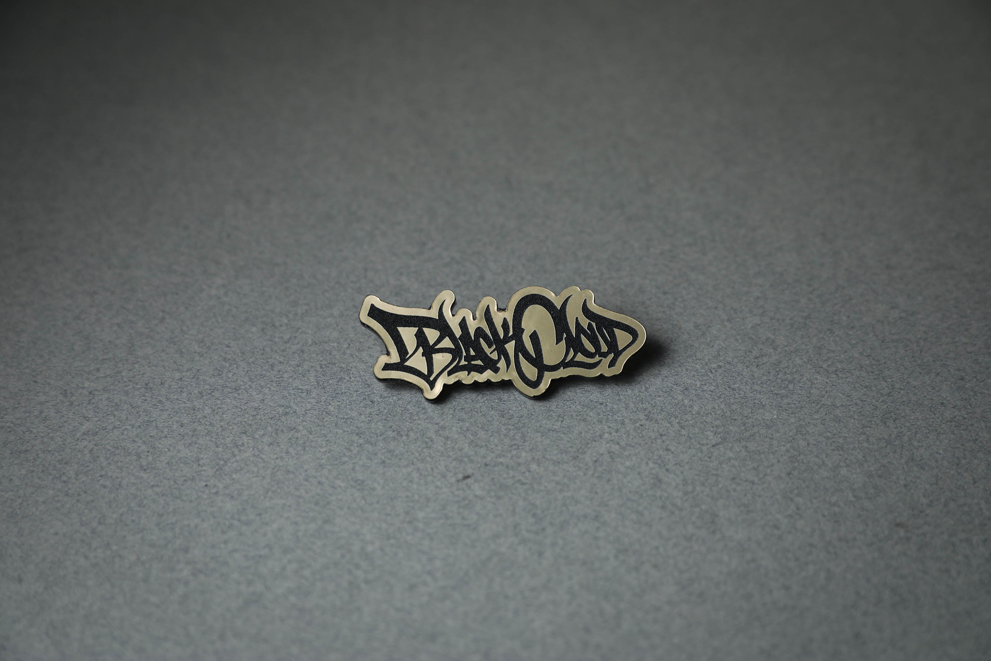 Black Cloud graffiti tag gold acrylic lapel pin