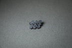 silver RX7 acrylic lapel pin