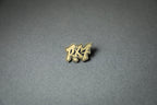 gold RX7 acrylic lapel pin