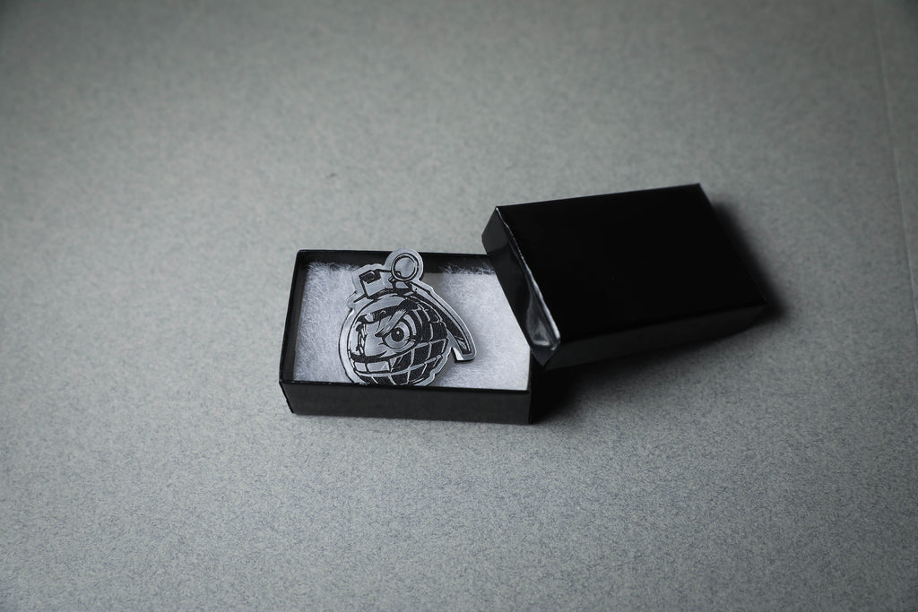 Daruma Bomb Silver Lapel Pin in box