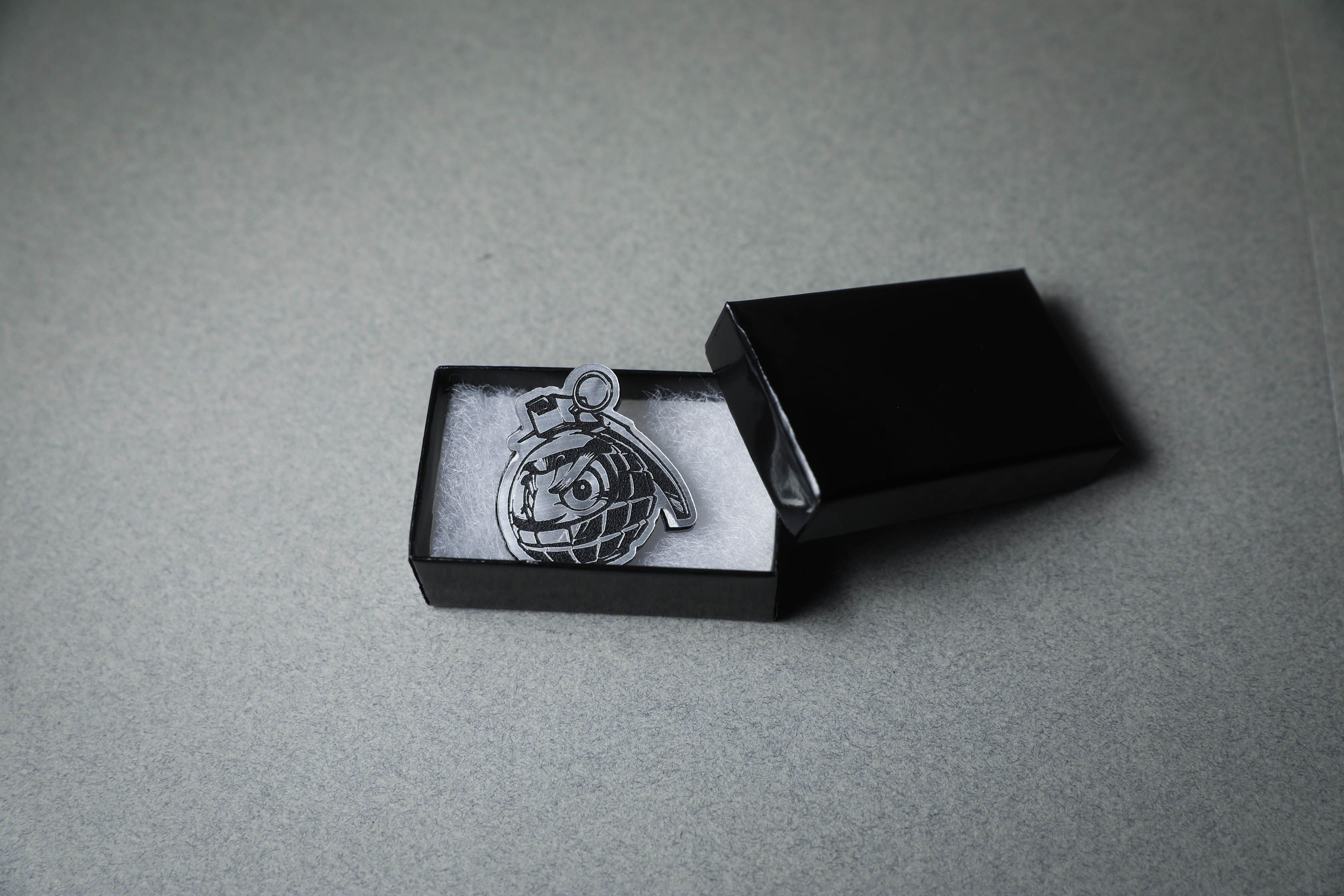 Daruma Bomb Silver Lapel Pin in box