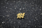 gold RX7 acrylic lapel pin