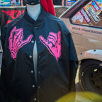 Black unisex nylon lined baseball jacket with promise (Yakusoku) design on front and black cloud Japanese kanji letters on the back in hot pink