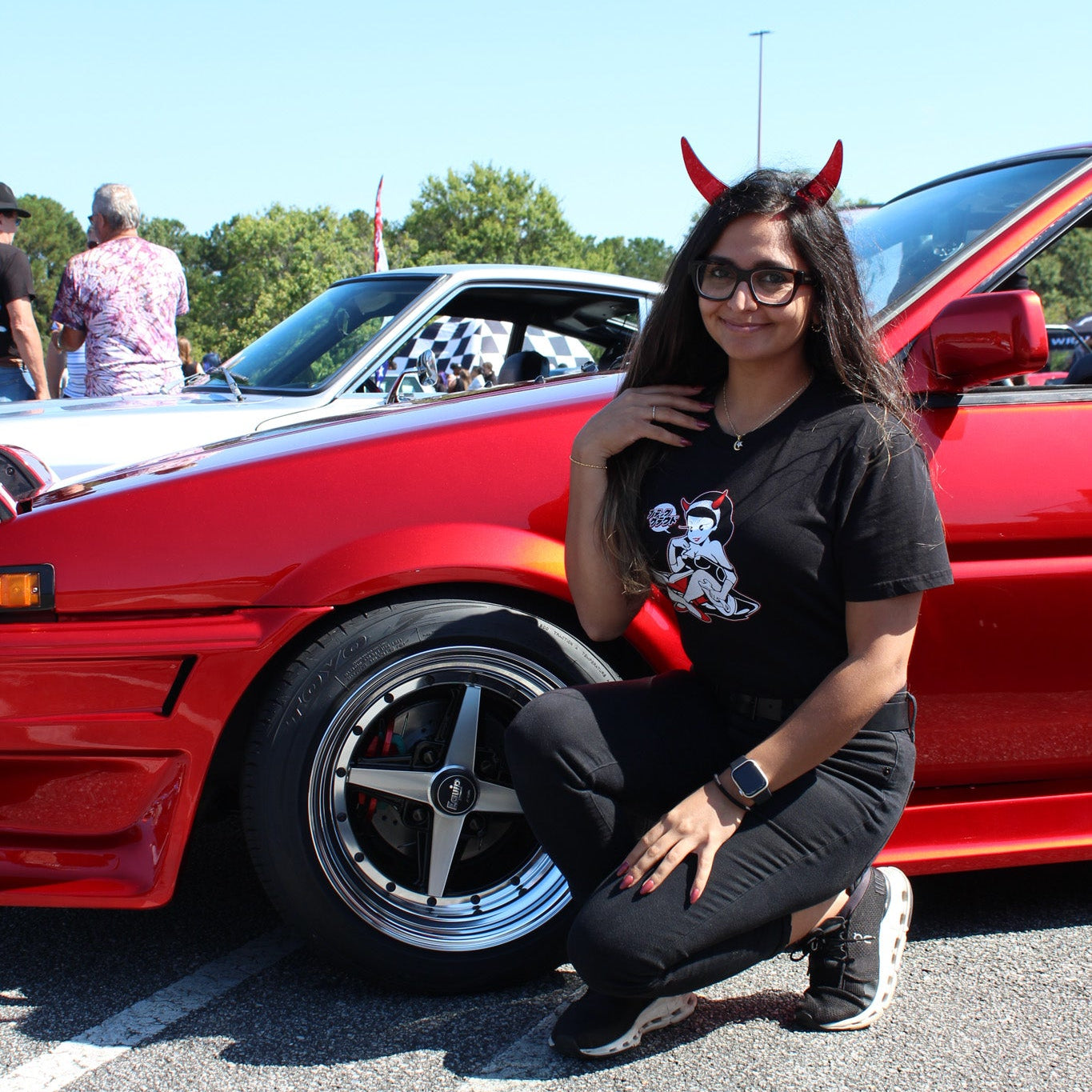 Black cotton unisex T-shirt with BLK CLD Vintage Malpractice design on front only in white and red ink and Black Cloud red devil horns