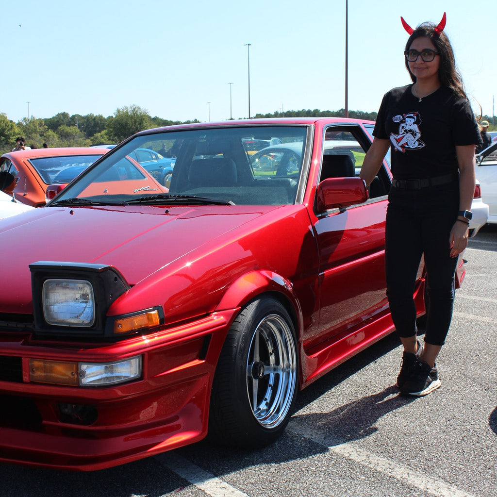 Black cotton unisex T-shirt with BLK CLD Vintage Malpractice design on front only in white and red ink and Black Cloud red devil horns