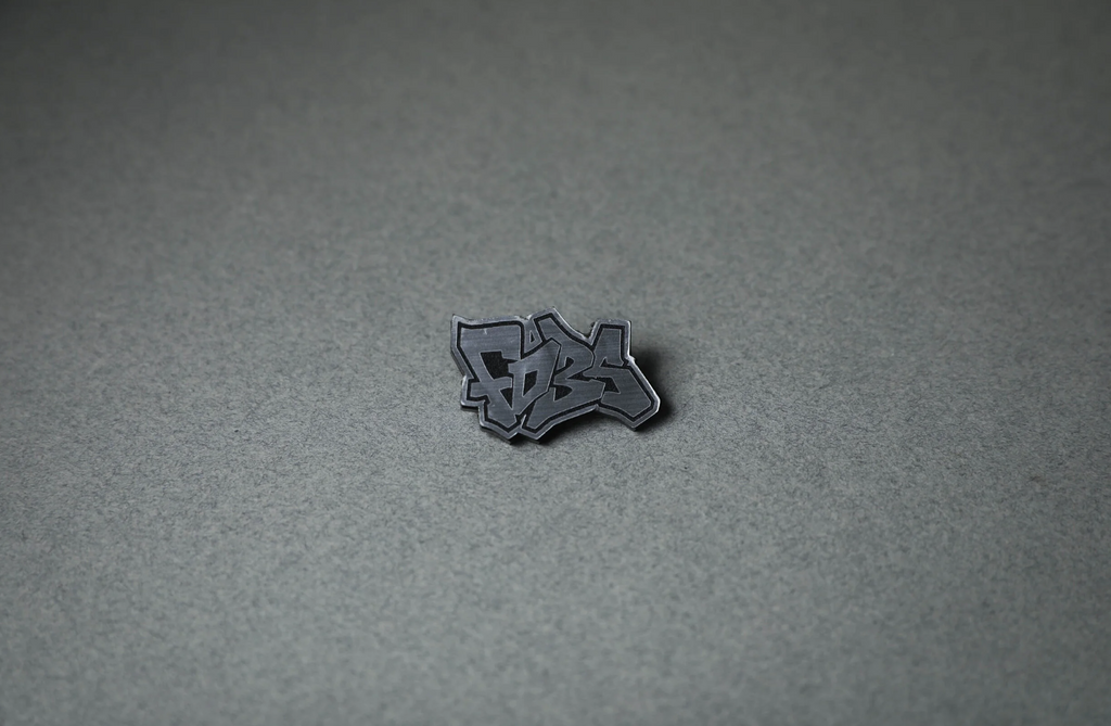 silver FD3S acrylic lapel pin