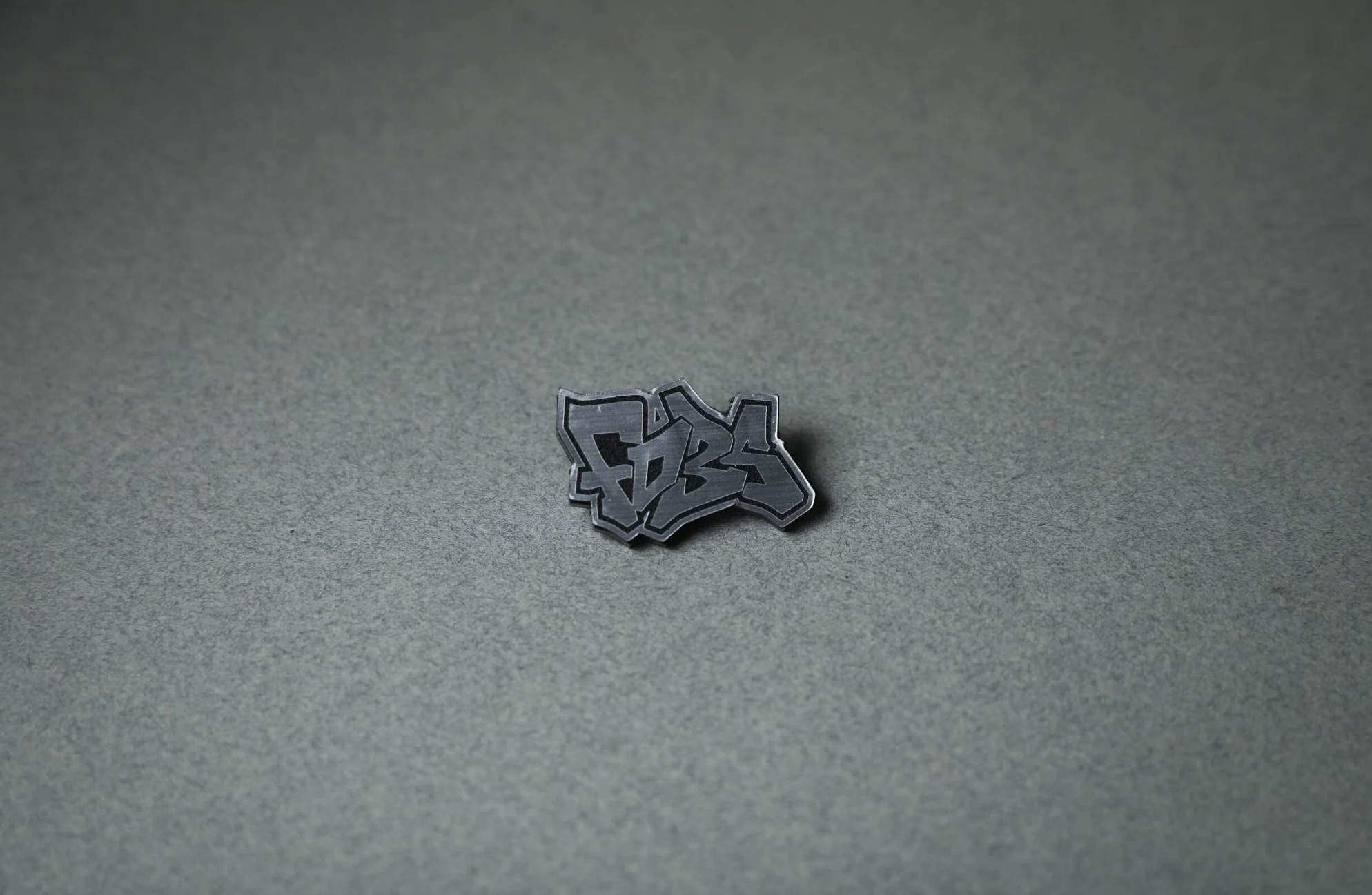 silver FD3S acrylic lapel pin