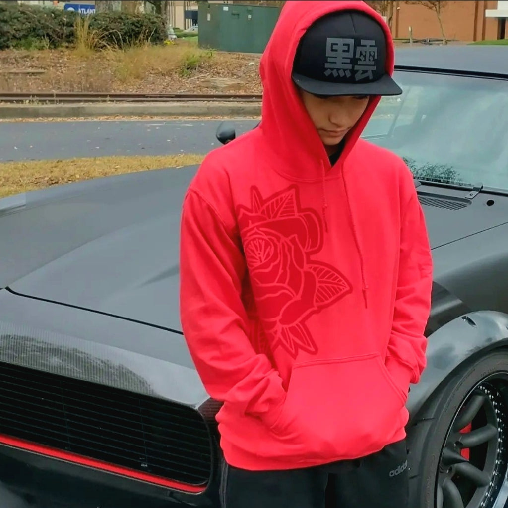 Unisex Pretty PSI red hoodie with turbo rose design on front in red velvet flock and black cloud Japanese kanji characters in red velvet flock on back. Black cloud Kuro Kumo Japanese Kanji characters in gray on black snapback hat.